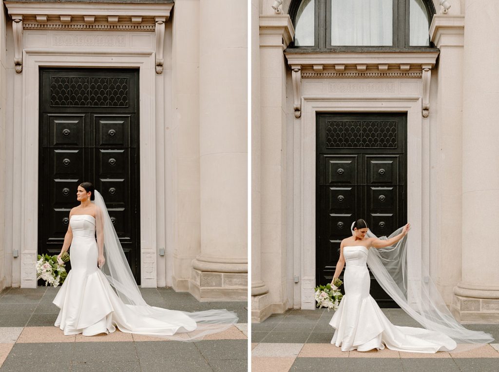 bride standing outside alone fixing her vail 