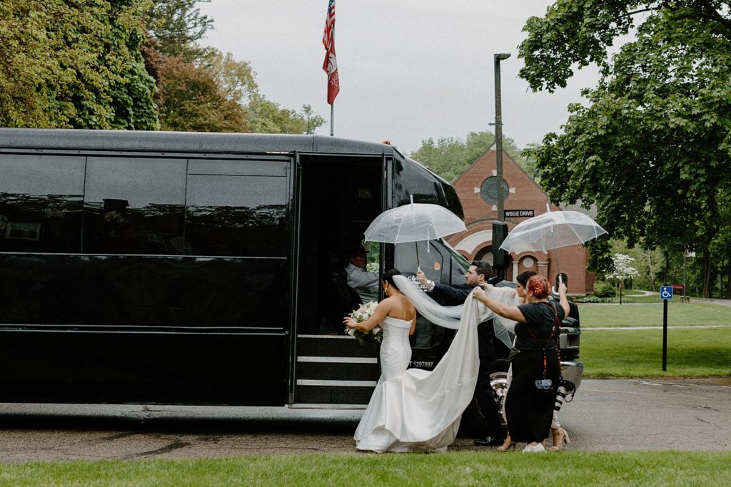 couple walking towards a limo about to get in 
