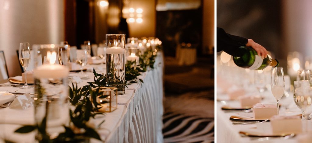 champagne being poured into a glass on a reception table 