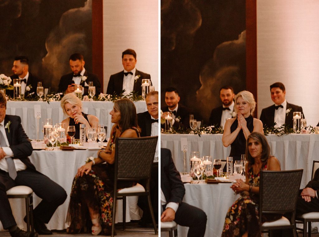 family members smiling and sitting at tables 