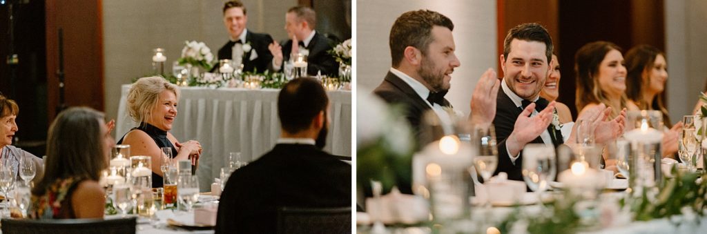 guests and wedding party smiling and clapping 