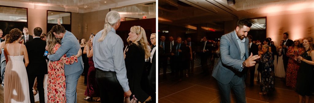 wedding guests dancing together at reception 