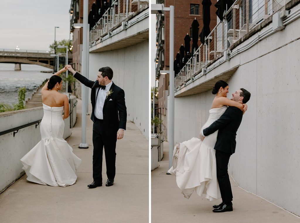 couple dancing on a sidewalk near the water 
