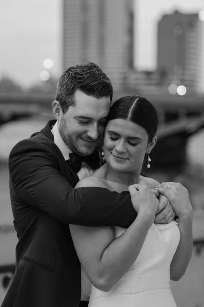 couple hugging each other with their heads touching 