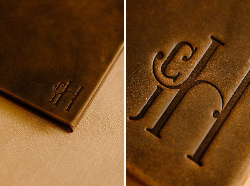 Two close up views of the corner of a wedding album with initials pressed into the leather.