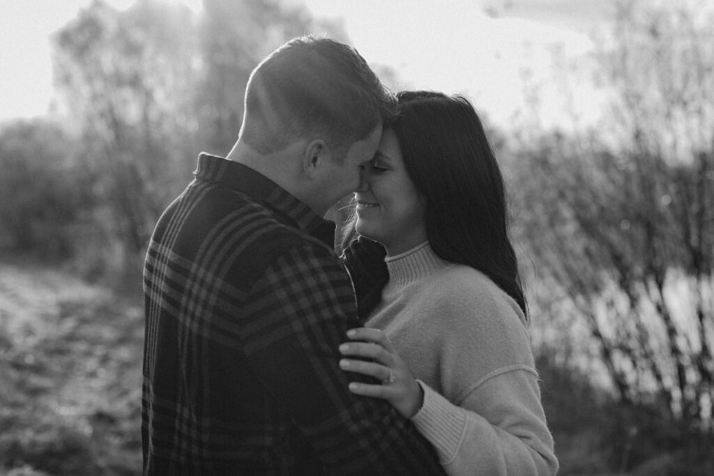 couple standing close together as they are about to kiss